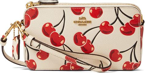 coach cherry print crossbody bag.